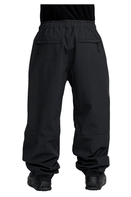 Black snow pants on a white background
