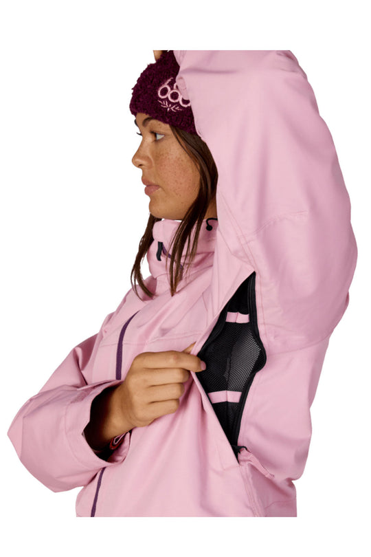 Person wearing a pink jacket with a hood on a white background