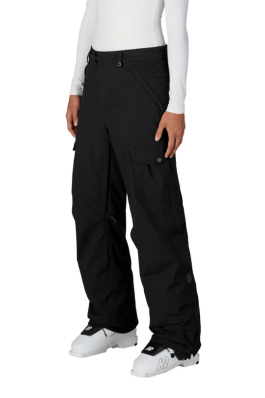 Person wearing black cargo pants on a white background