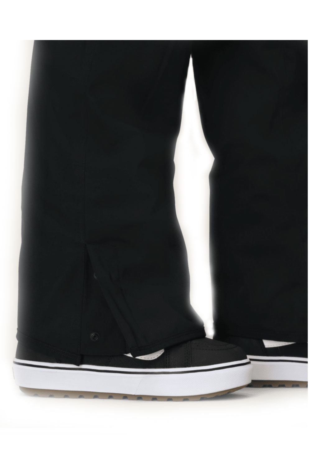 Black pants with white soles on a white background