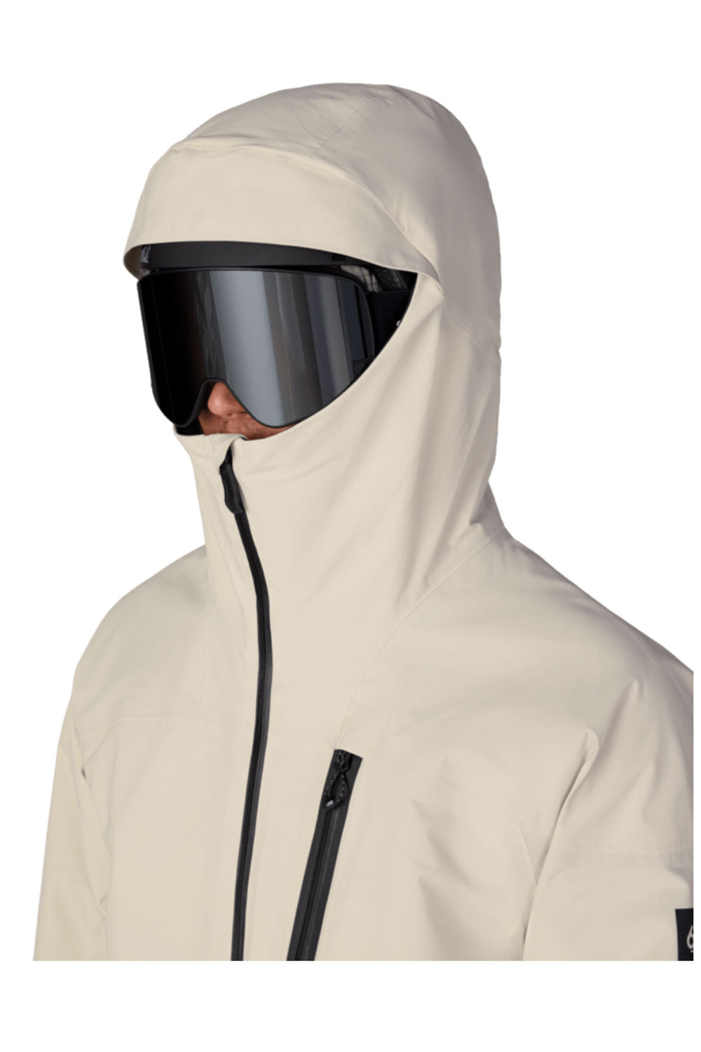 Person wearing a beige hooded jacket with a black visor on a white background