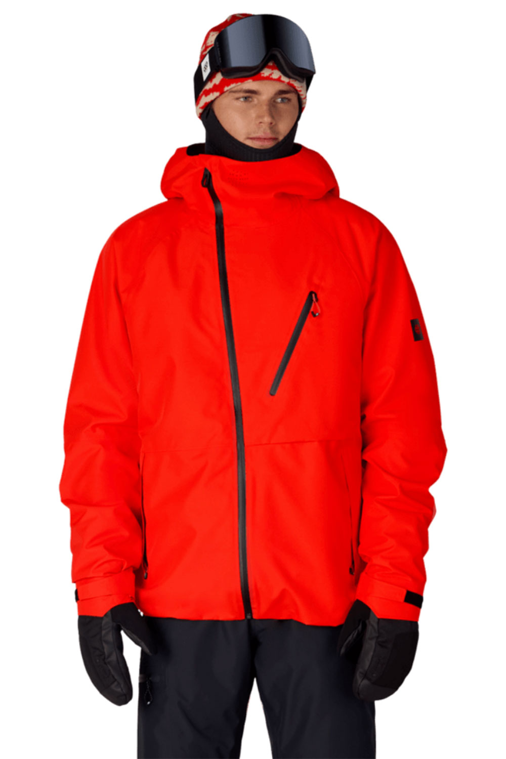 Person wearing a bright red snow jacket with black accents on a white background