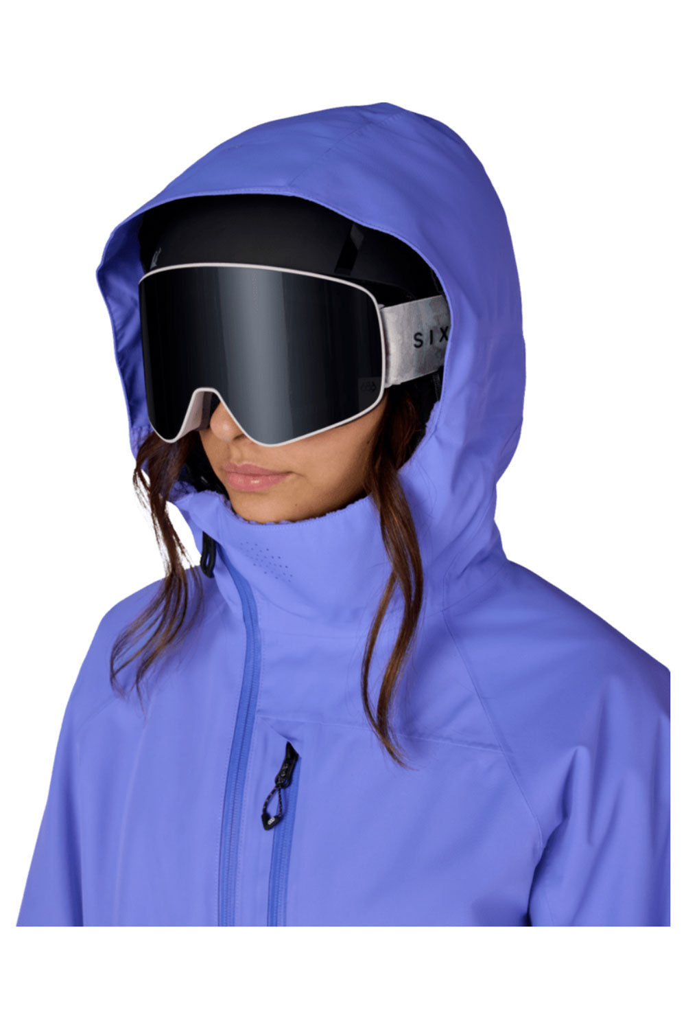 Person wearing a blue hooded jacket and goggles on a white background