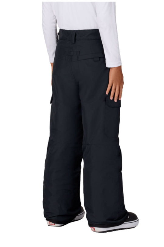 Black snow pants worn by a person on a white background