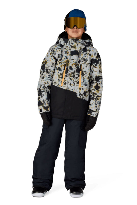 Person wearing a patterned jacket and black pants on a white background