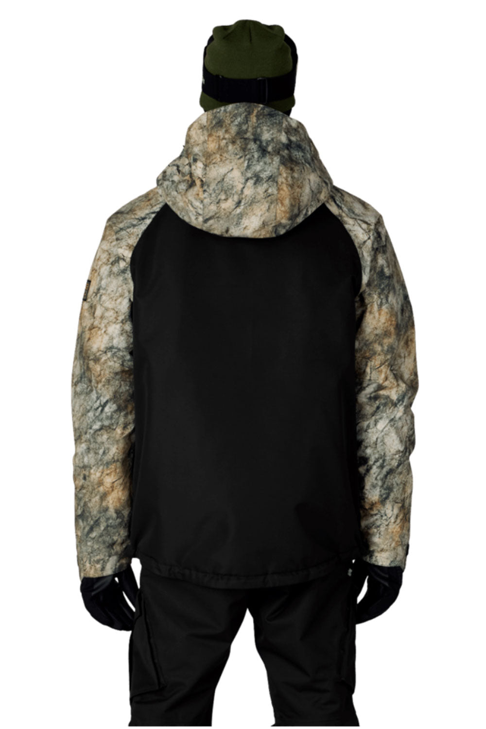 Person wearing a black jacket with camouflage hood and sleeves on a white background
