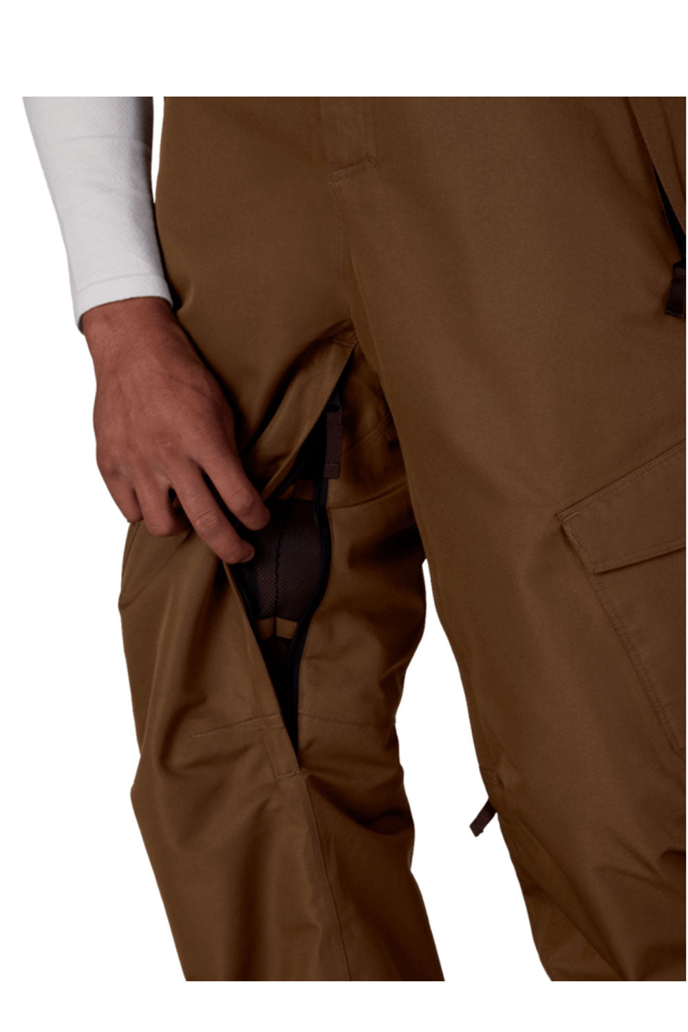 Brown pants with a hand adjusting the waistband on a white background