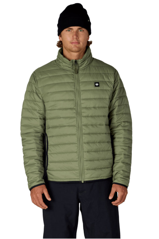 Man wearing a green puffer jacket with a brand logo on a white background