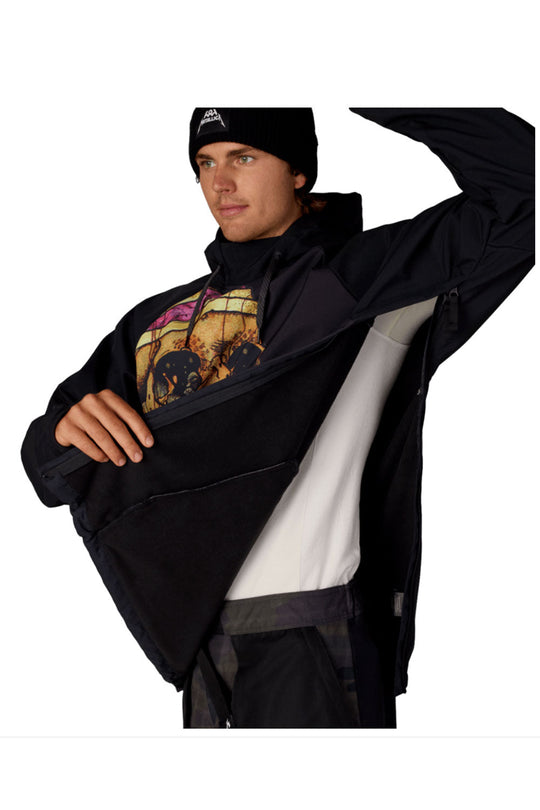 Person wearing a black jacket with a colorful graphic on a white background