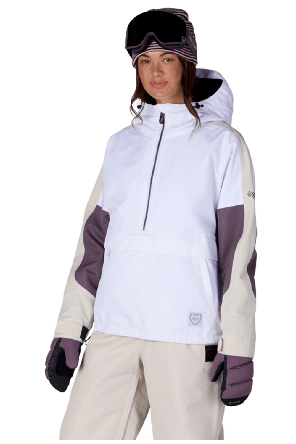 Person wearing a white and purple snow jacket with matching pants on a white background