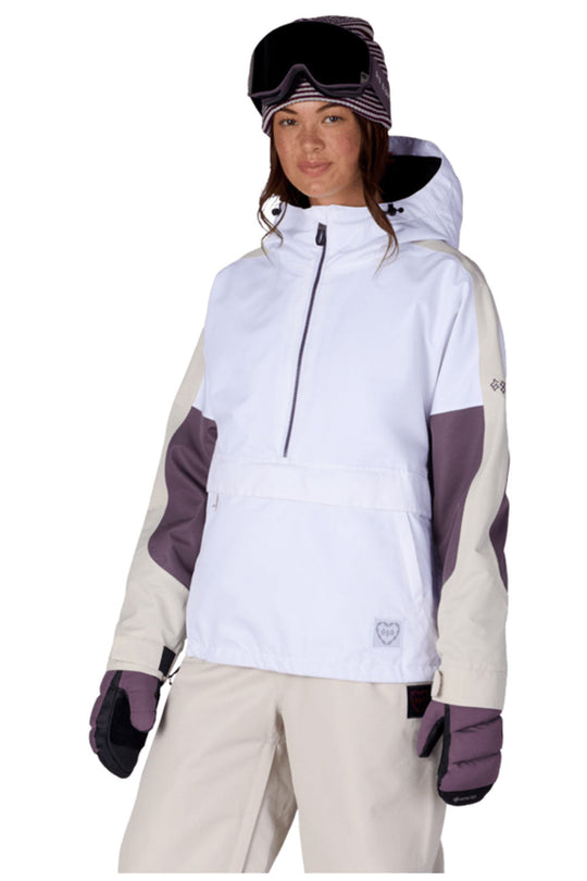 Person wearing a white and purple snow jacket with matching pants on a white background