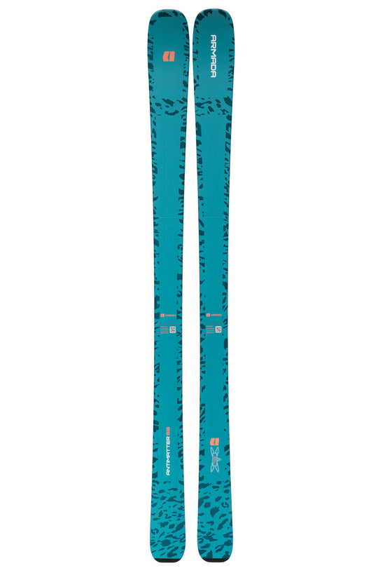 Pair of blue skis with a pattern on a white background
