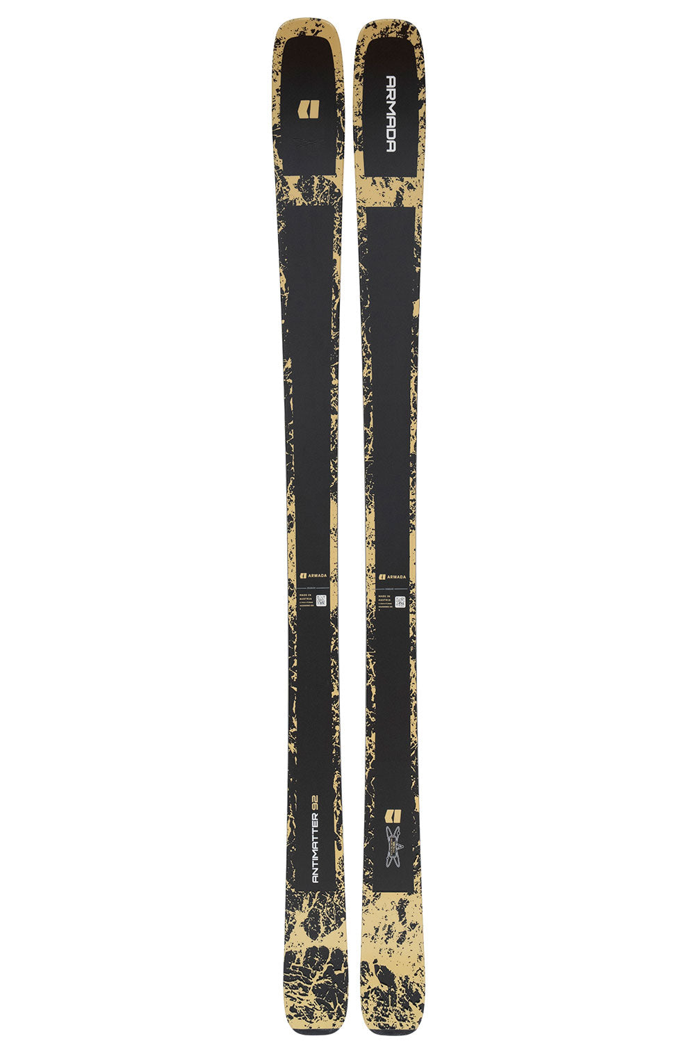 Pair of black and gold skis on a white background