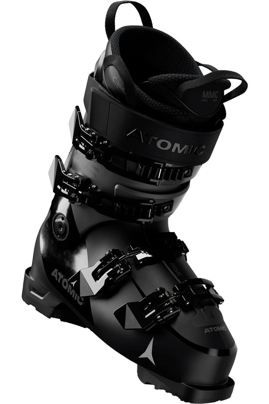 Black ski boots with Atomic branding on a white background