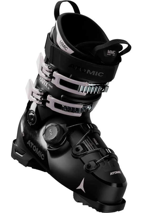 Black ski boot with visible Atomic branding on a white background