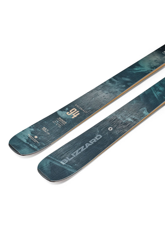 Two blue skis with 'Blizzard' branding on a white background