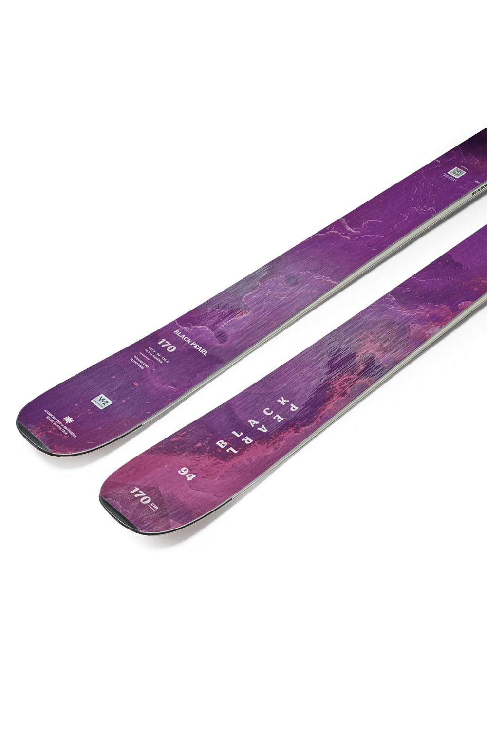 Purple skis with a pattern on a white background