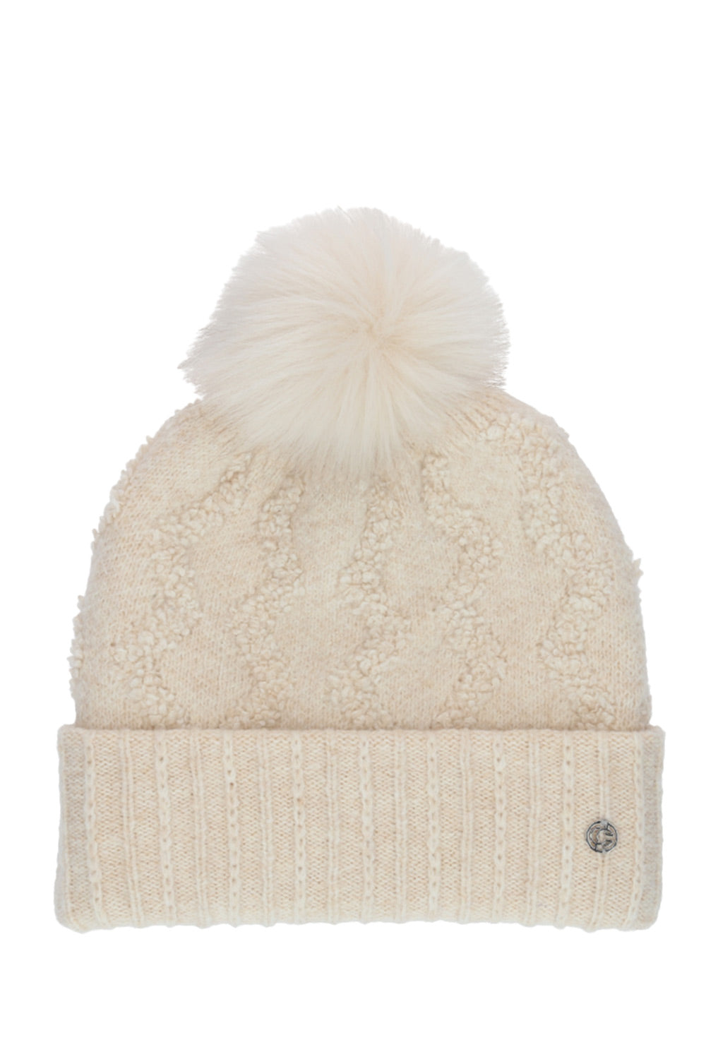 A cream-colored textured knit beanie with a matching fluffy pom-pom on top and a ribbed cuff, featuring a small silver-tone logo button on the side.