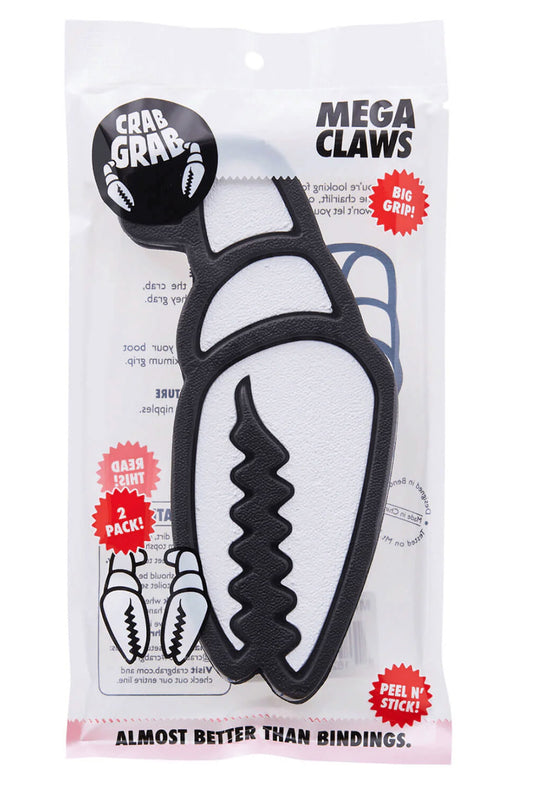A packaged pair of black and white plastic claw tools labeled 'MEGA CLAWS' on a white background. The package includes printed graphics, a black 'CRAB GRAB' sticker, and promotional red callouts.