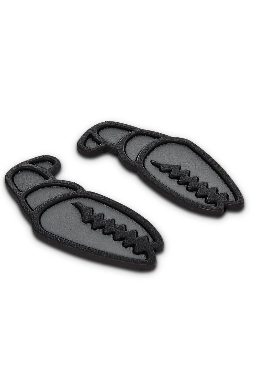 A pair of black rubber claw-shaped stomp pads with a textured, ridged design, displayed on a clean white background.