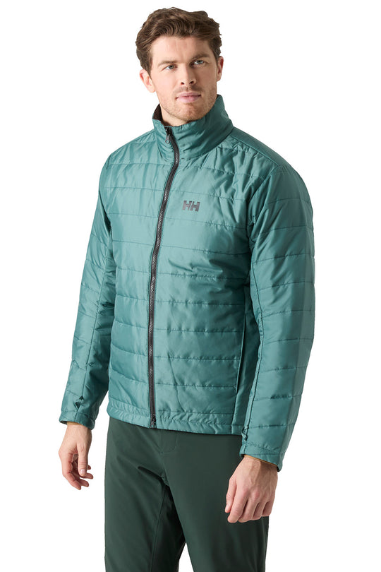 A man wearing a teal green quilted puffer jacket with a black zipper and a small gray logo on the left chest, paired with dark green pants, against a plain white background.