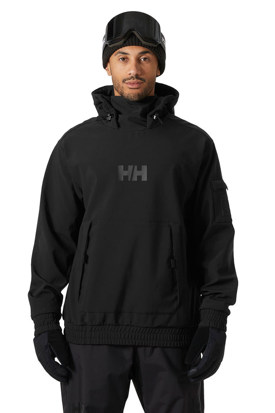 A man wearing a black Helly Hansen hooded jacket with a dark gray HH logo on the chest, black beanie with goggles, and black gloves, shown against a plain white background.
