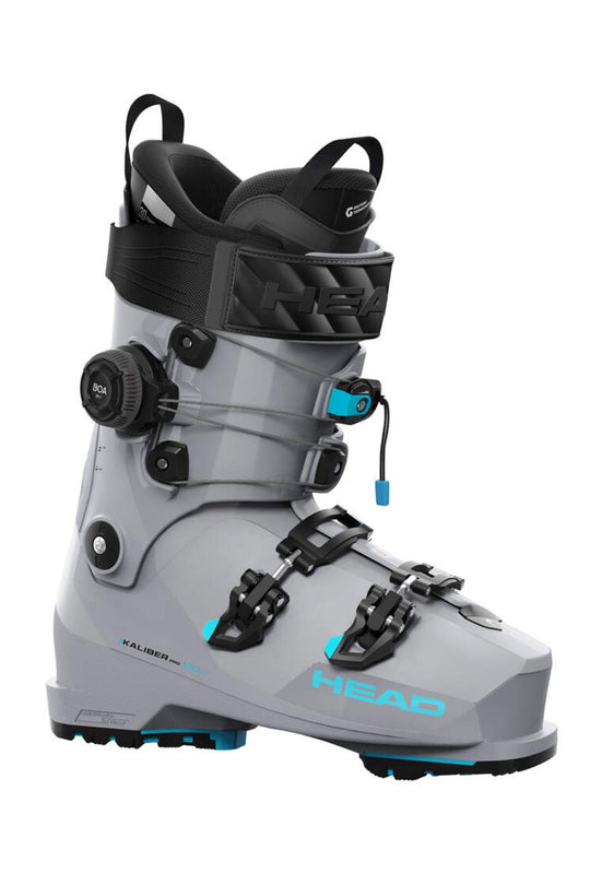 A Head ski boot in light gray with black buckles and straps, accented by bright blue details and the 'head' logo on the side, shown against a plain white background.