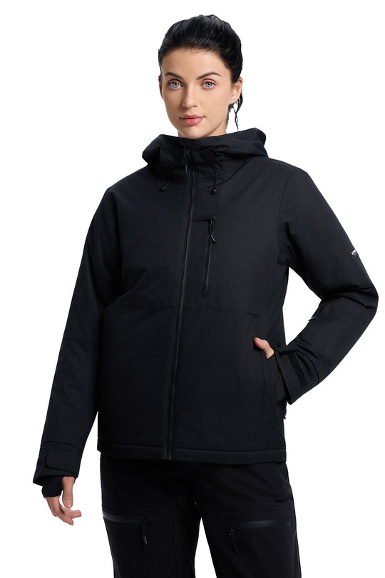 A woman modeling a black hooded jacket with a full front zipper, zippered chest pocket, and side pockets, paired with black pants against a plain white background.
