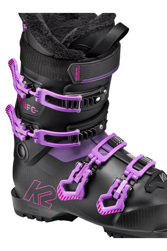 Black and purple ski boot with K2 branding on a white background