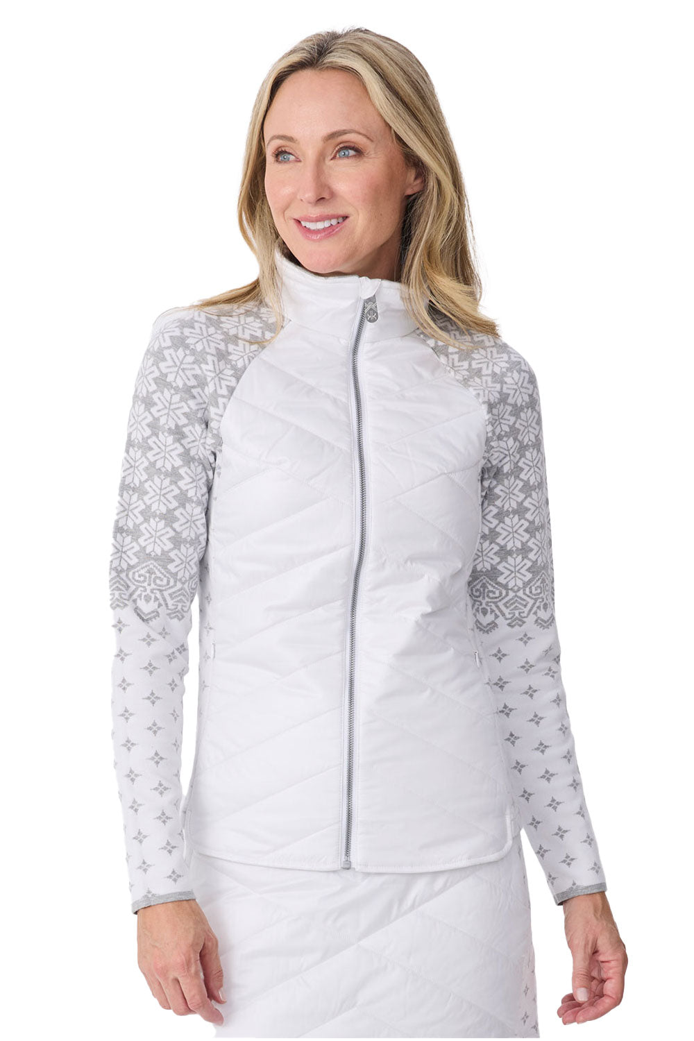 Woman wearing a white quilted jacket with lace sleeves on a white background
