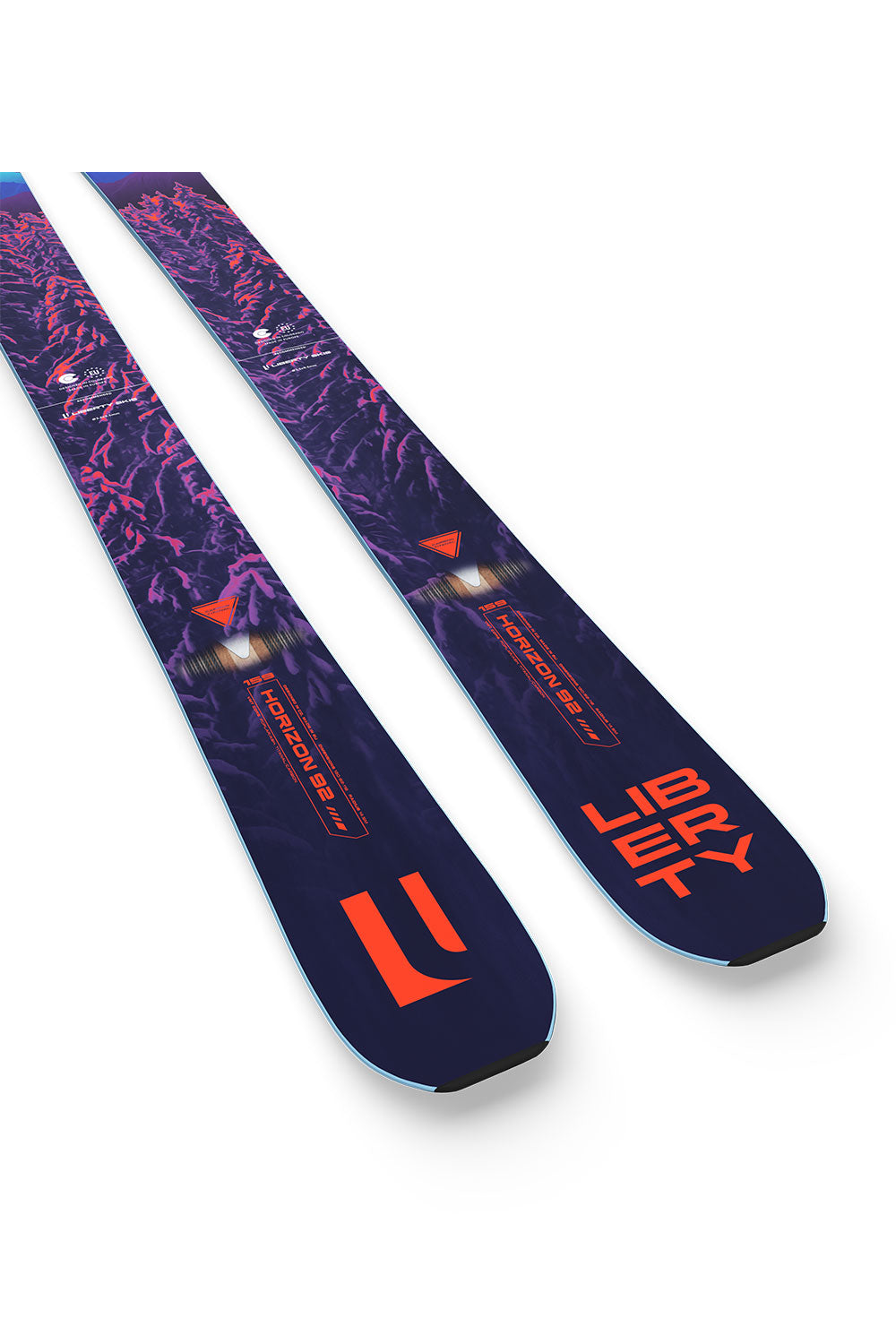 Two purple and blue skis with red branding on a white background
