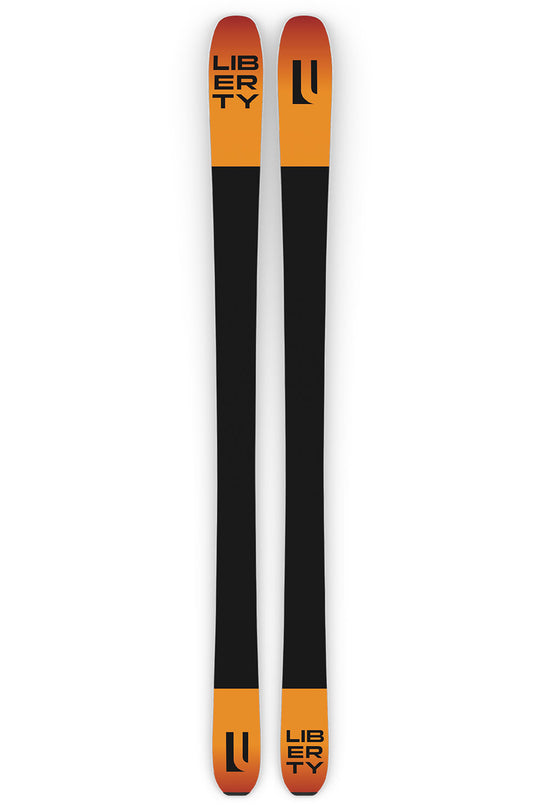 Two orange and black Liberty skis on a white background