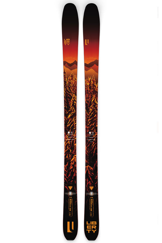 Two skis with a sunset design and Liberty branding on a white background