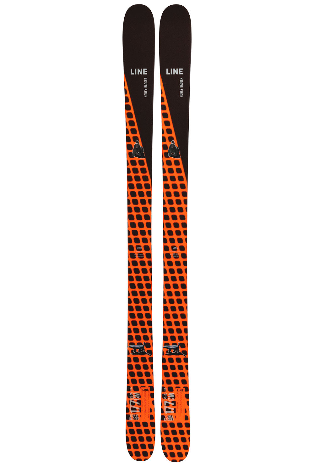 Pair of orange and black skis with 'Line' branding on a white background