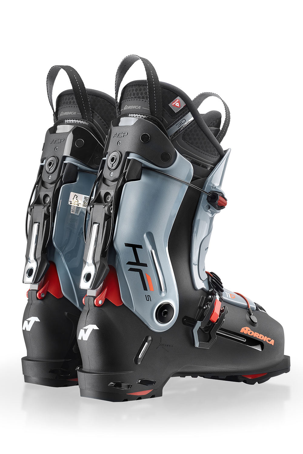 Pair of black and gray ski boots with visible branding on a white background
