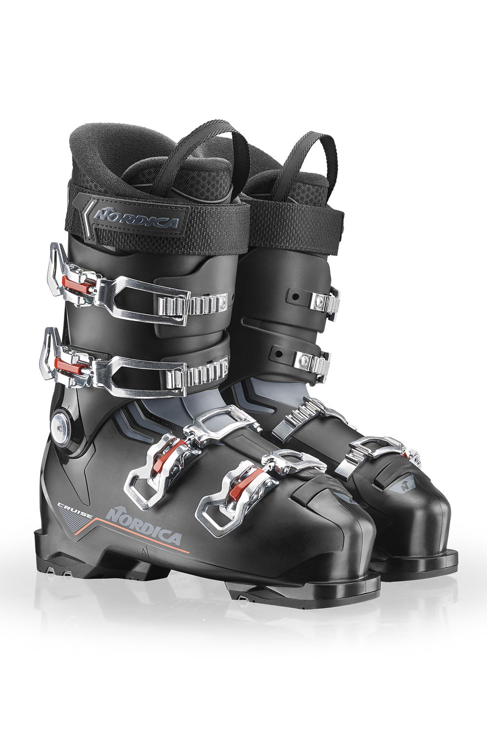 Black ski boots with silver buckles on a white background