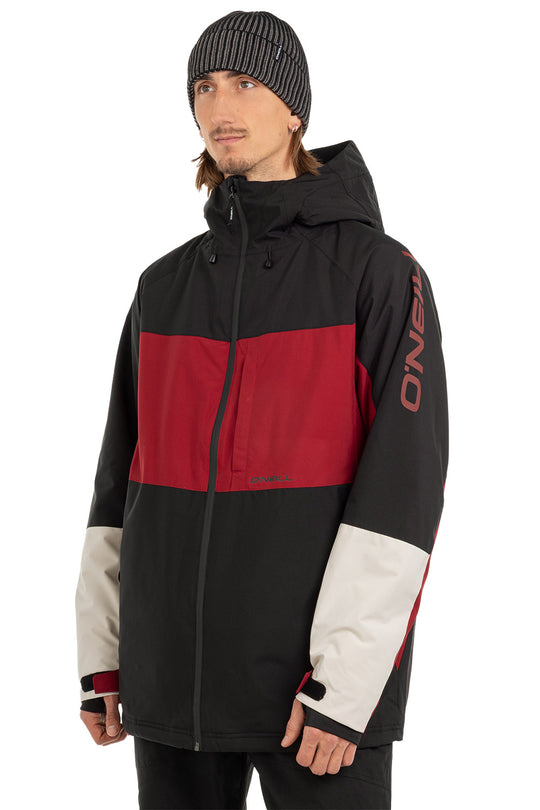 A man wearing a color-blocked ski jacket by O'Neill, featuring a black upper section, a wide red chest panel, and light beige lower sleeves, paired with a black beanie against a white background.