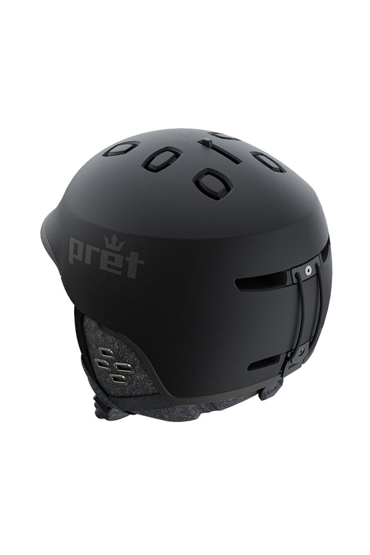 A matte black Pret snowboard helmet with multiple ventilation slots and a chin strap, shown from a three-quarters angle on a white background.