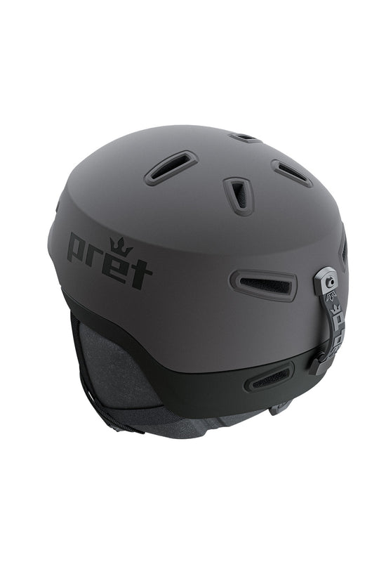 A matte grey ski helmet with the Pret brand logo printed on the side, shown against a plain white background.