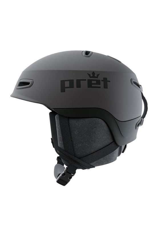 A matte grey ski helmet with the brand name 'pret' and a small crown logo printed on the side, shown from a three-quarters perspective against a solid white background.