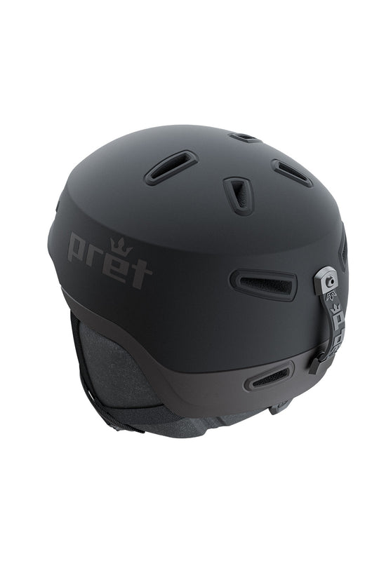 A matte black ski helmet with the 'pret' brand name and crown logo printed in gray on the side, shown against a plain white background.