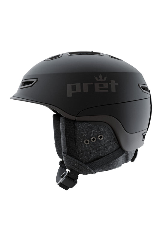 A matte black ski helmet with a dark gray printed 'pret' logo on the side, shown in profile against a solid white background.