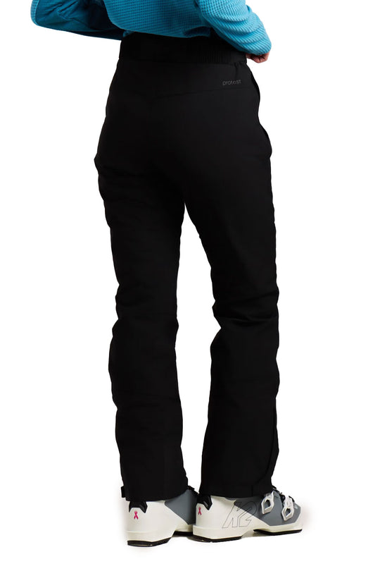 Black pants worn by a person on a white background