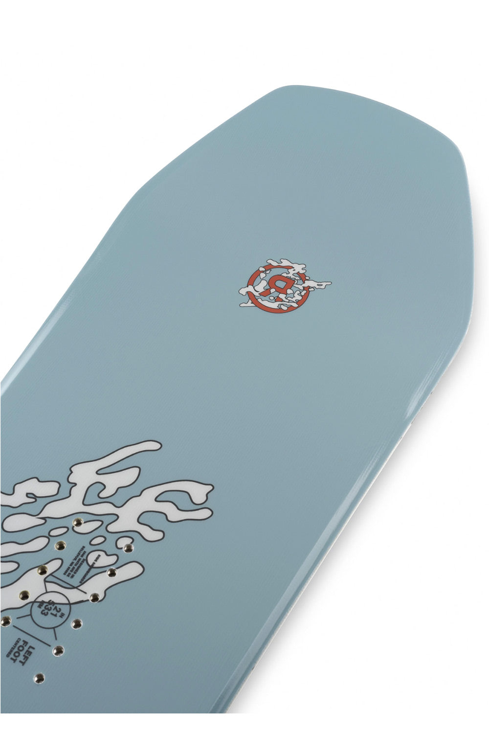 A close-up of a snowboard deck with a light blue base, featuring a red and white circular logo near the top and a white graphic near the bottom.