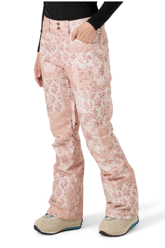 Pink floral-patterned pants worn by a person on a white background