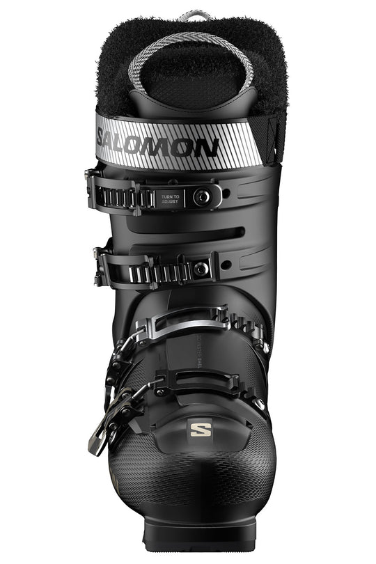 Black ski boot with Salomon branding on a white background
