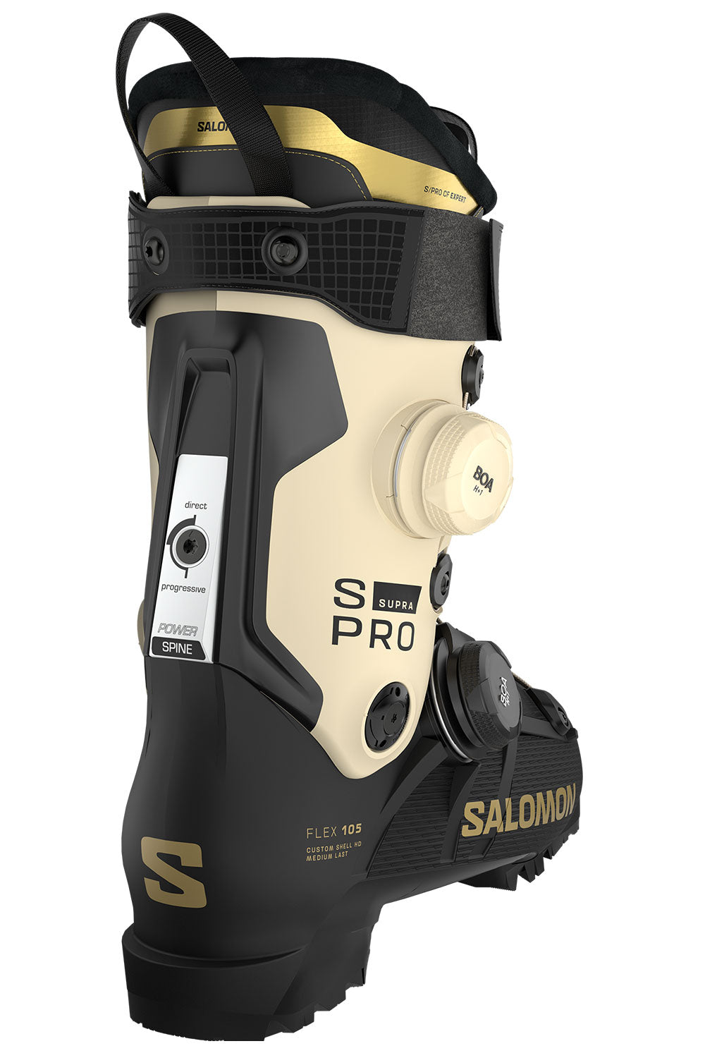 Salomon S Pro ski boot in black and cream with gold accents, featuring a dial closure system and a visible valve connector on a white background.