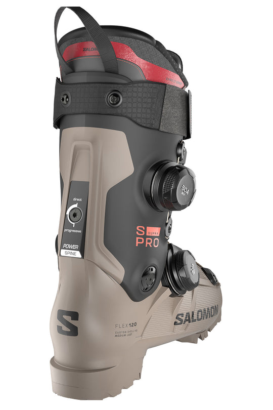 Salomon ski boot in a gray and black colorway with red accents, featuring dual dial closures and a heel release system, shown on a plain white background.