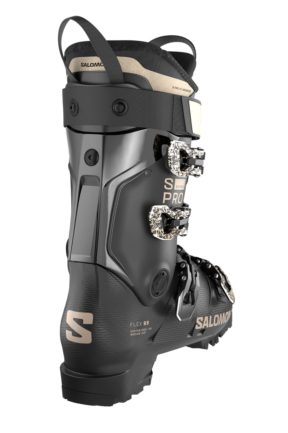 Salomon ski boot in black with beige branding and silver buckle hardware, shown from a side profile on a white background.