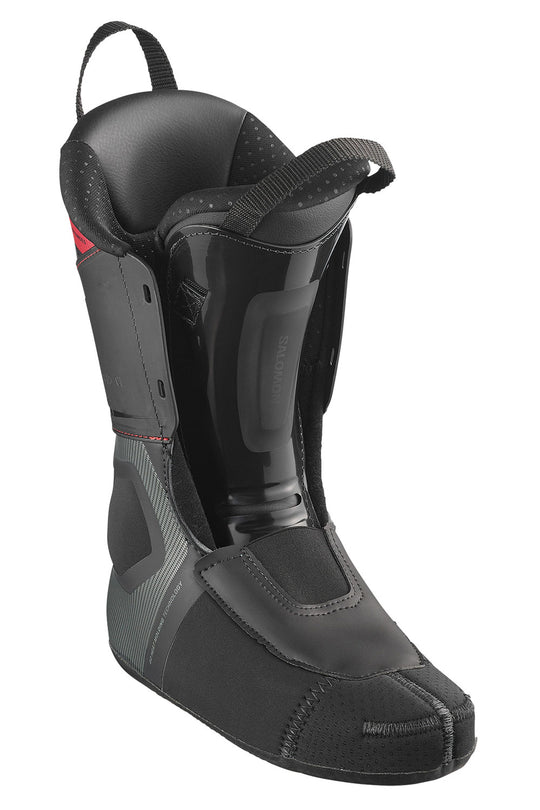 A black and dark gray ski boot liner
with a small red accent logo, shown on a plain white background.